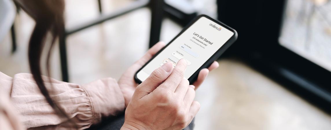A smartphone in the woman's hands.